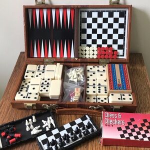 Domino set Backgammon set chess and checkers
